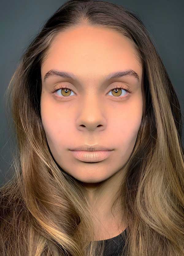 Client before makeup transformation at Tracy's Beautique
