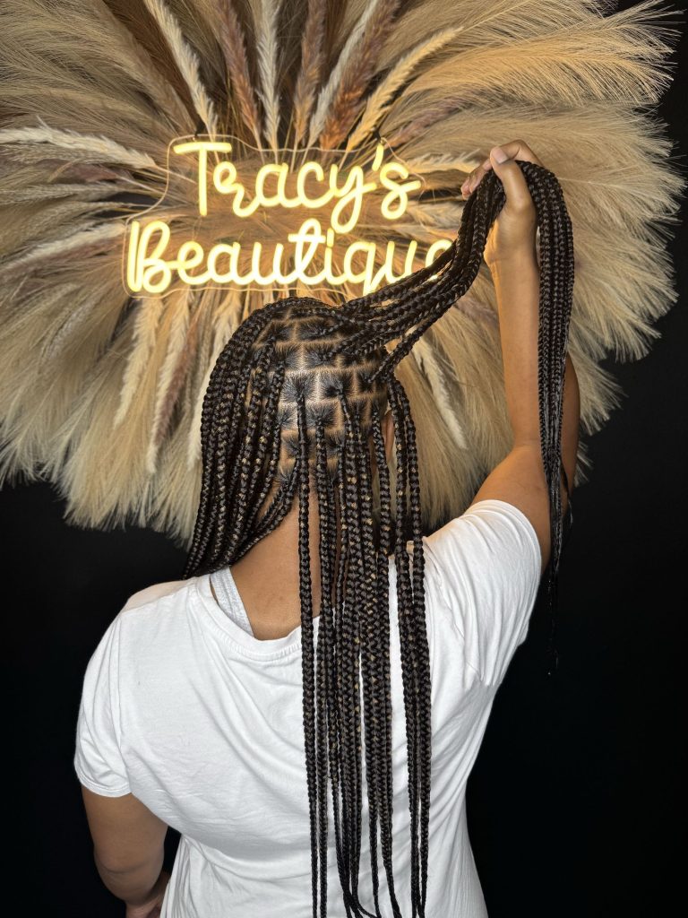 Braiding hairstyle by Tracy's Beautique