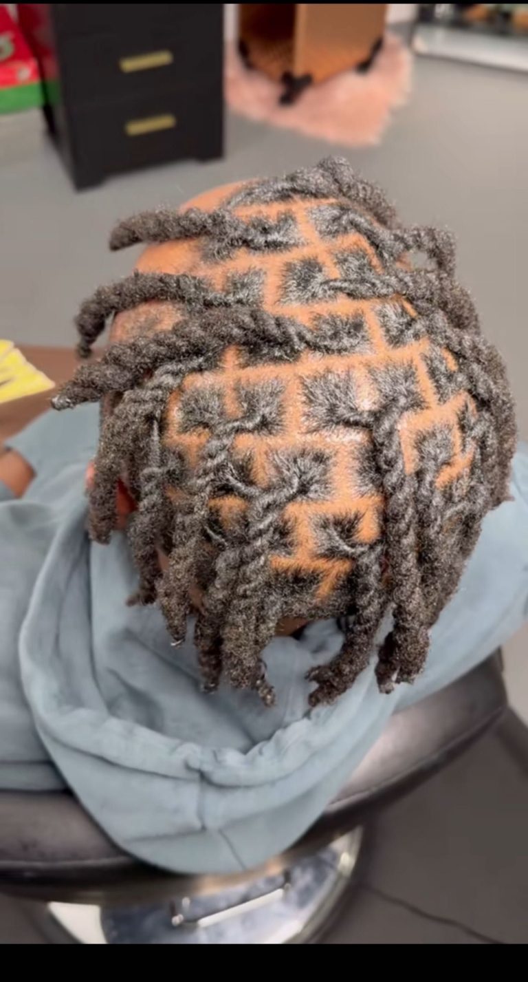 Locs hairstyle by Tracy's Beautique in Austell GA