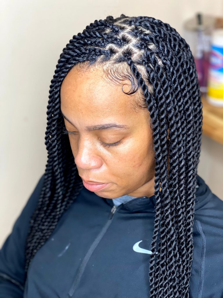 Twist braids hairstyle at Tracy's Beautique